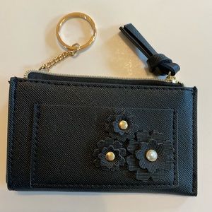 ID wallet with key ring.
